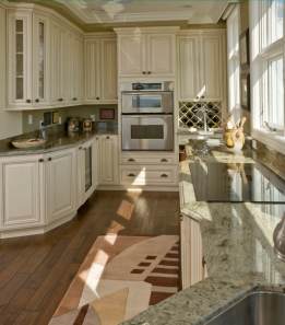 cute-white-kitchen-cabinets-with-black-countertops-wood-floor-istock-000006136171-mediumjpg-kitchen